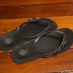 Tory Burch sparkly silver flip flops with bow
